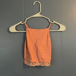 Cris cross back coral top with adjustable straps for shoulders and lace bottom